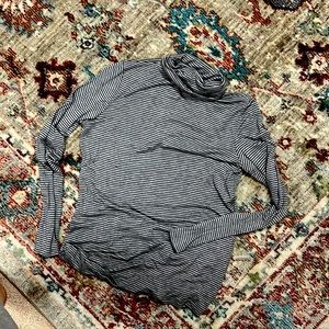 Gray and black striped turtleneck shirt